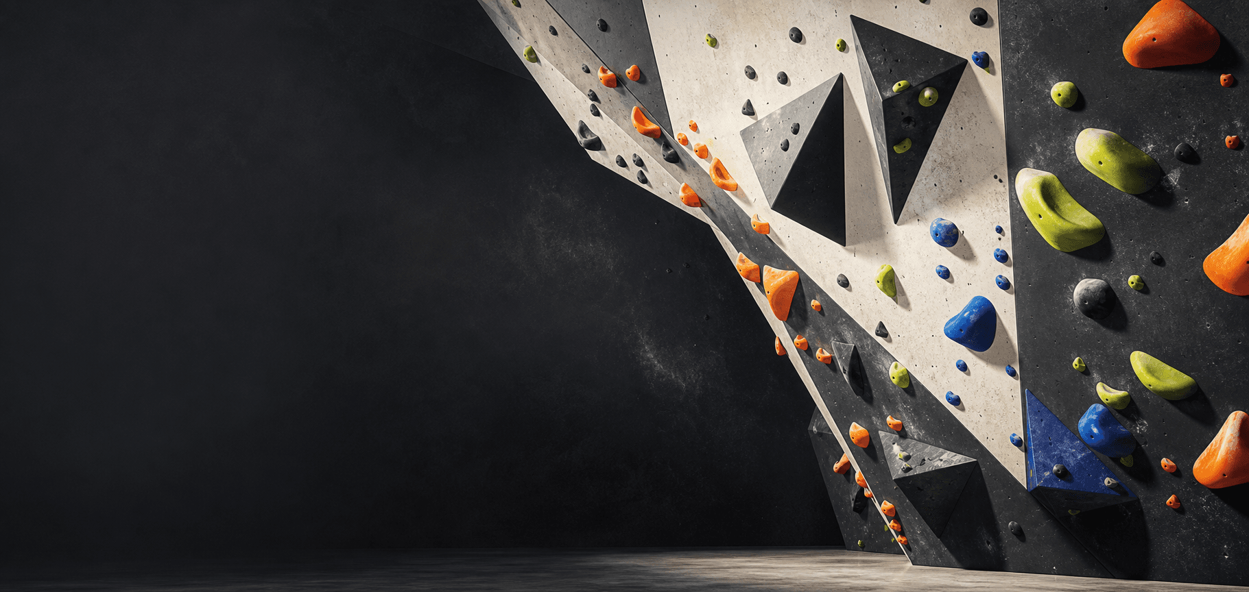 Stylized indoor bouldering wall with bright holds and geometric volumes